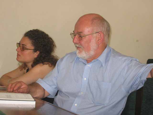 Eddie and Maria look on