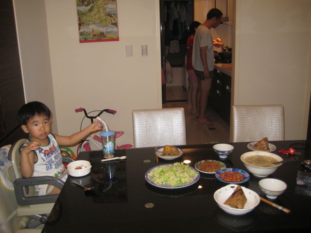 Dinner with Cephas as Abe and Grace cook in the kitchen