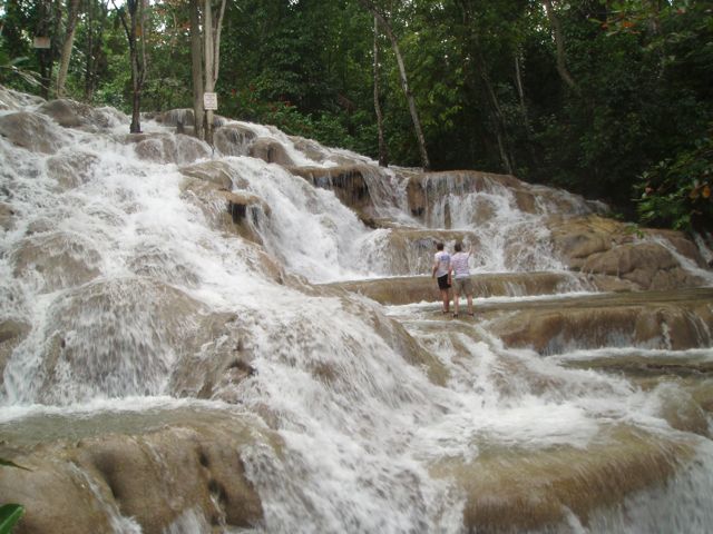 Chris climbs a waterfall