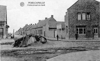 Tank between wars as town is built around it